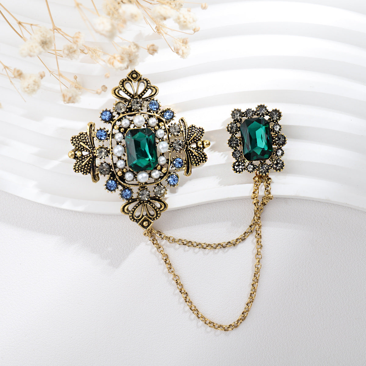 Brooch worn on jacket showing versatility