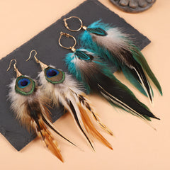 Fashion model wearing feather earrings