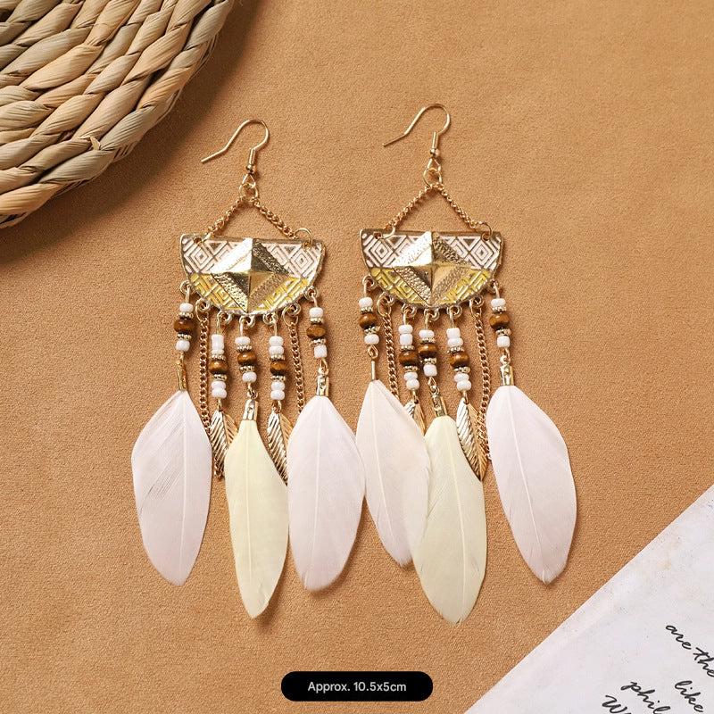 handcrafted feather earrings with long tassels
