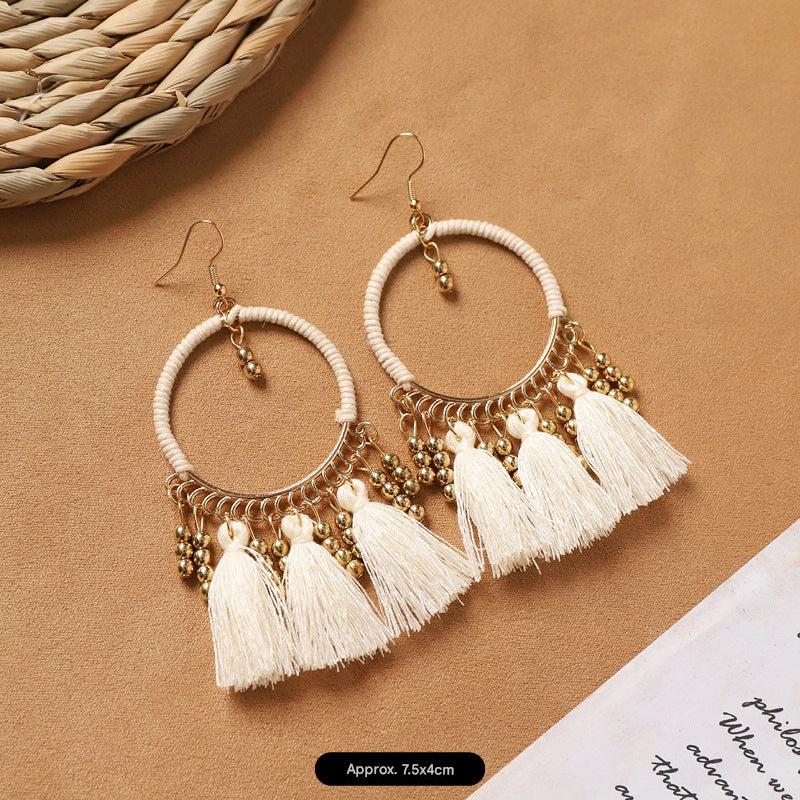 fashion-forward feather earrings look