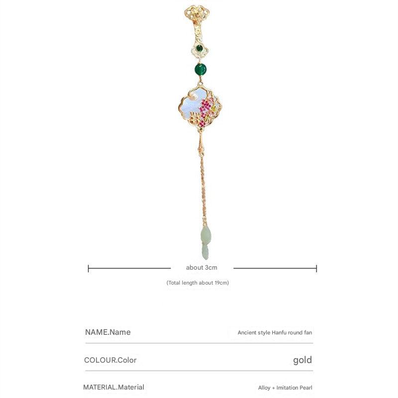 Stylish brooch showcasing gold leaf details