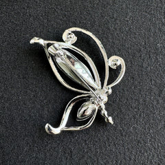 Sparkling crystal details of the butterfly brooch