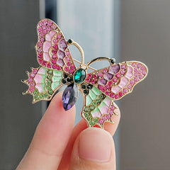 Detailed image of enamel brooch on a coat
