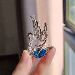 Swan Brooch featured as a trendy outfit accessory