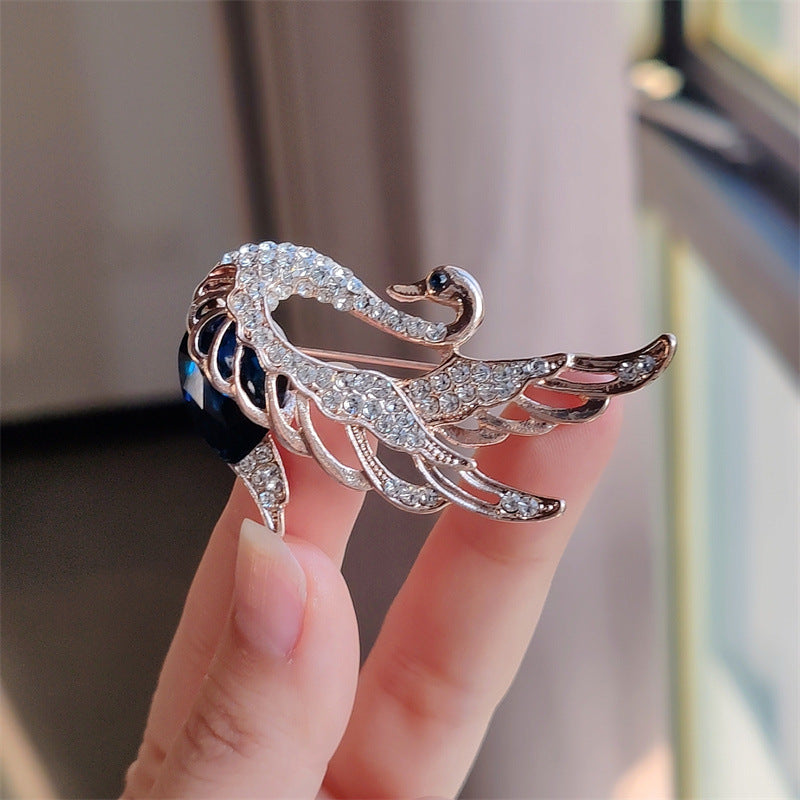 Swan Brooch displaying a stylish pink design