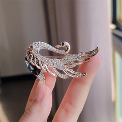 Close-up of Crystal-accented Swan Brooch for women