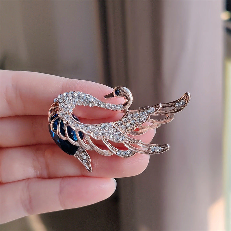 Versatile Swan Pin perfect for blazers and dresses