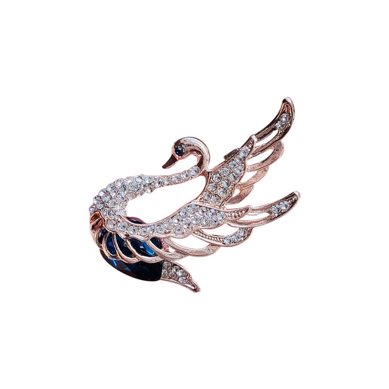 Swan Brooch displaying a stylish pink design