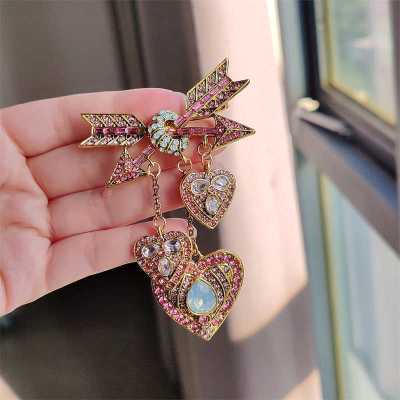 Detailed shot of Cupid heart arrow with tassel