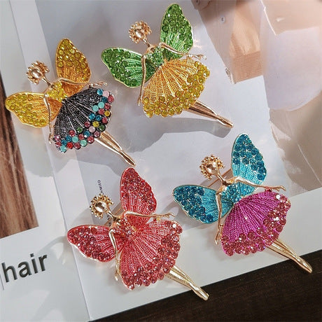 Stylish women's brooch worn on a sweater
