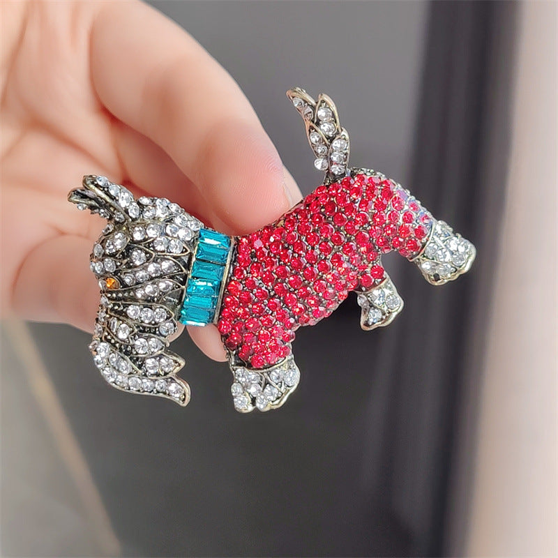 Close-up of vibrant animal brooch with sparkling details