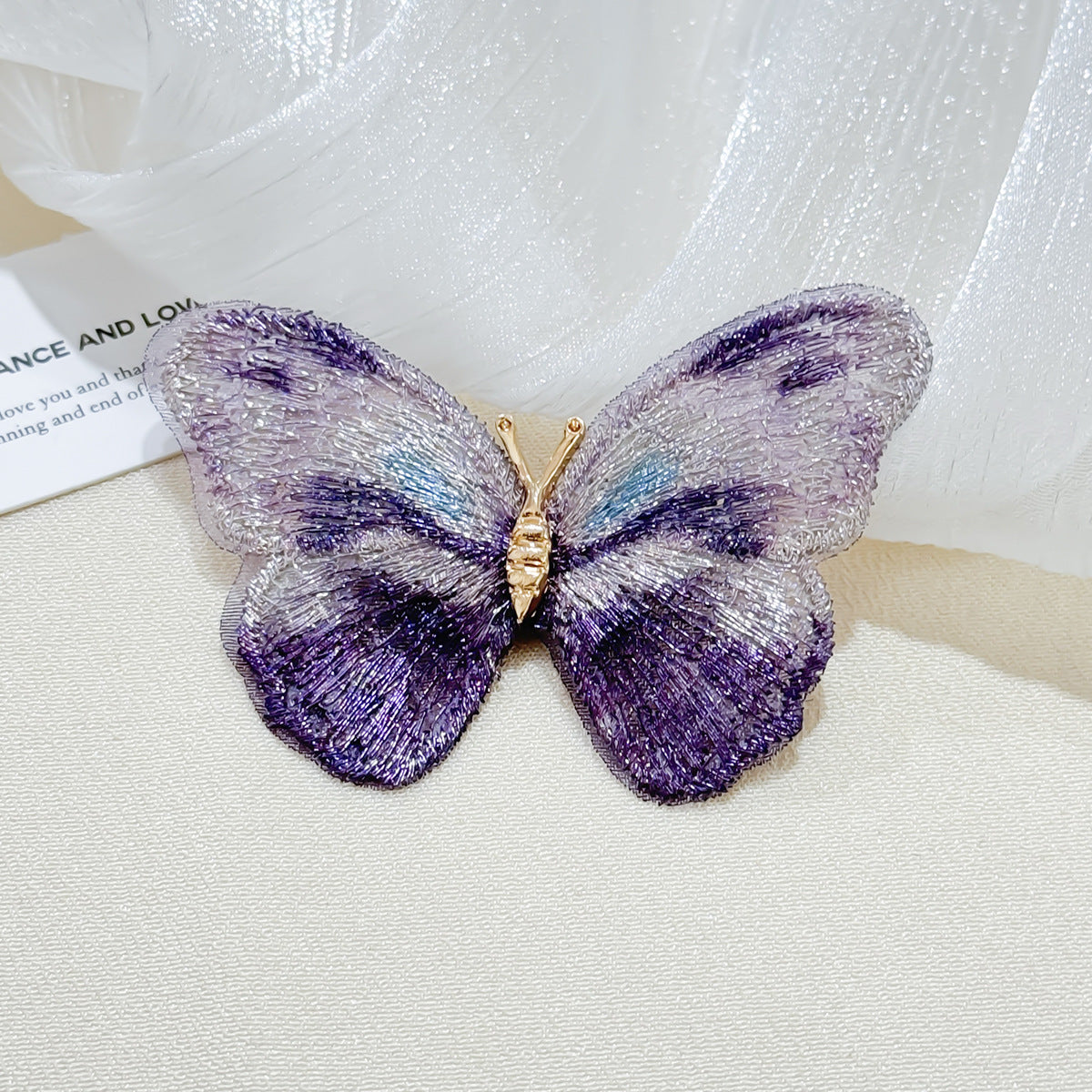 Elegant butterfly brooch front view