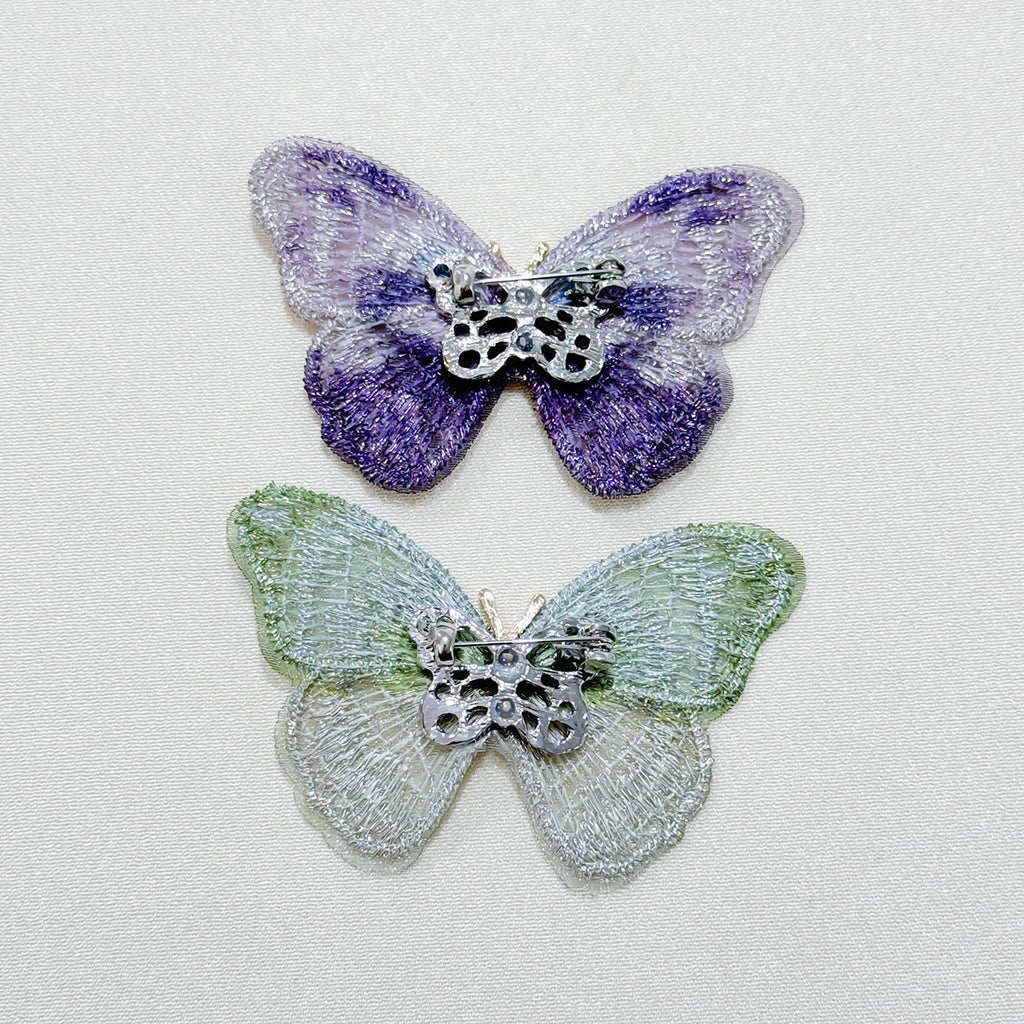 Colourful butterfly brooch with intricate details