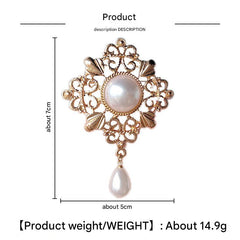 An ornamental brooch featuring pearl accents