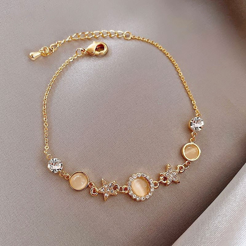 Close-up of cat eye stone in star bracelet