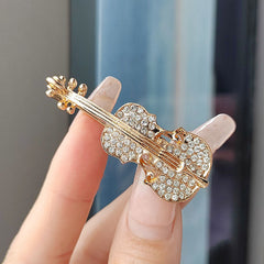 Rhinestone detailing on the violin brooch