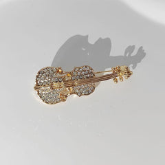 Stylish brooch on a dark background