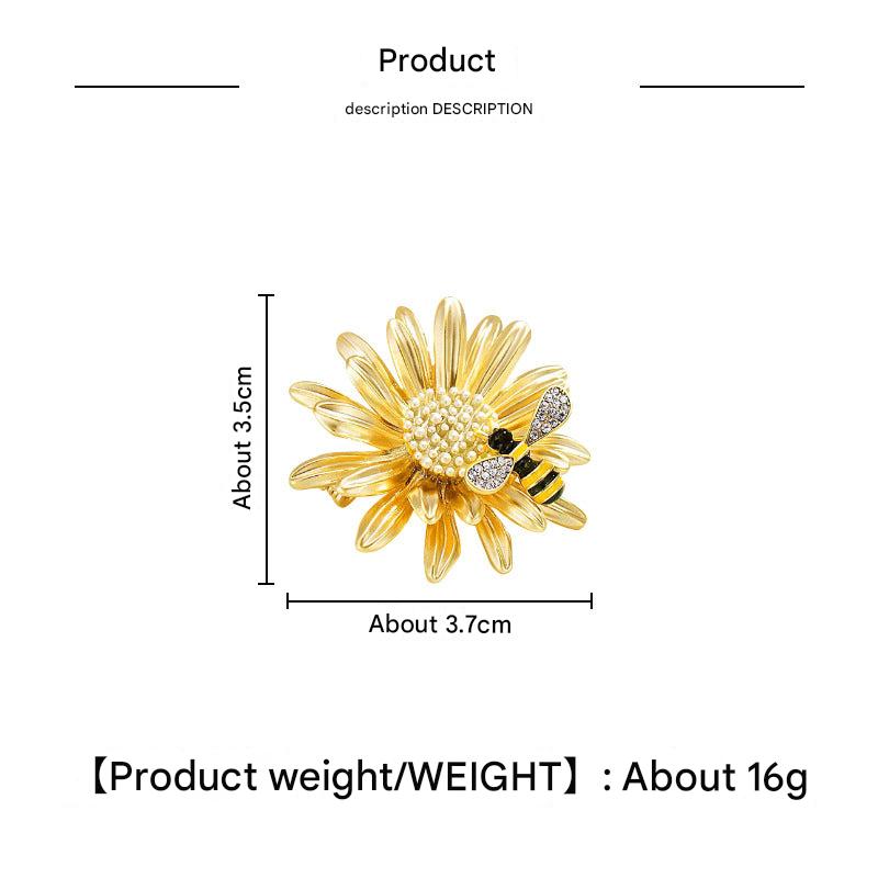Daisy design brooch on a handbag