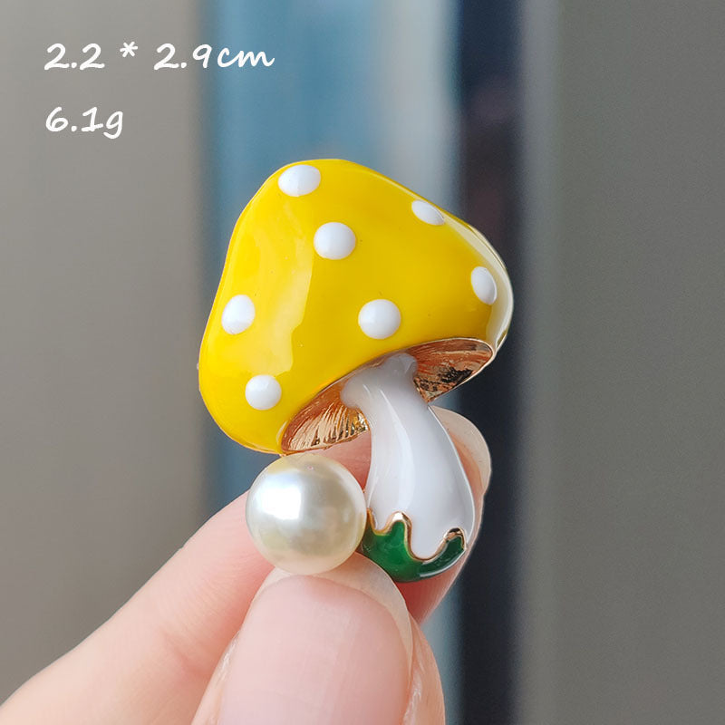 Cute Cartoon Mushroom Brooch showcased against bright backdrop
