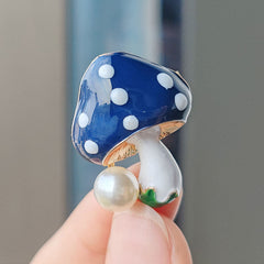 Close-up of Cute Cartoon Mushroom Brooch details