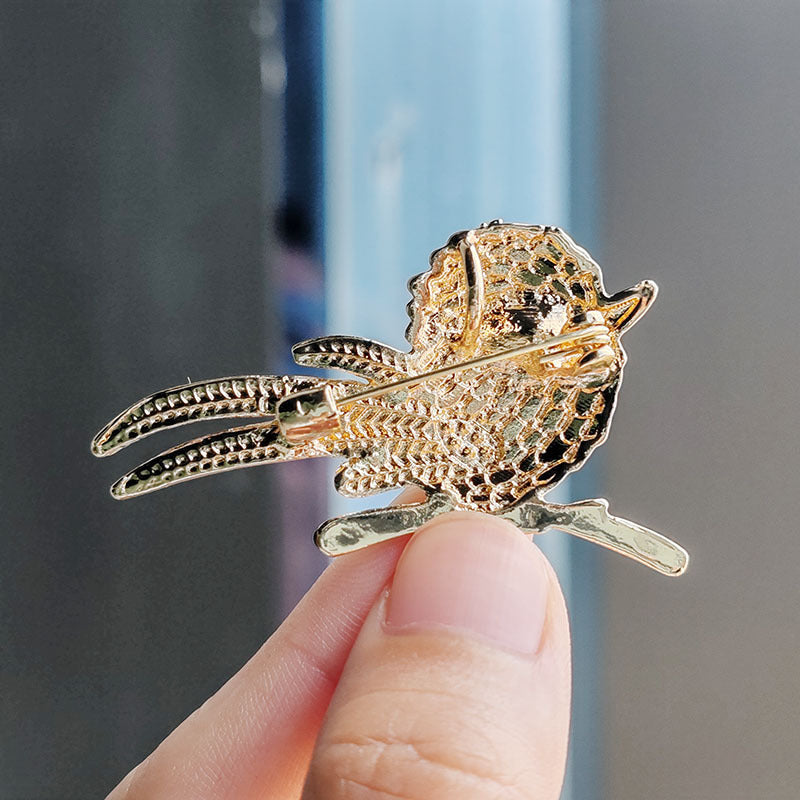 Cute bird pin accessory styled on a jacket