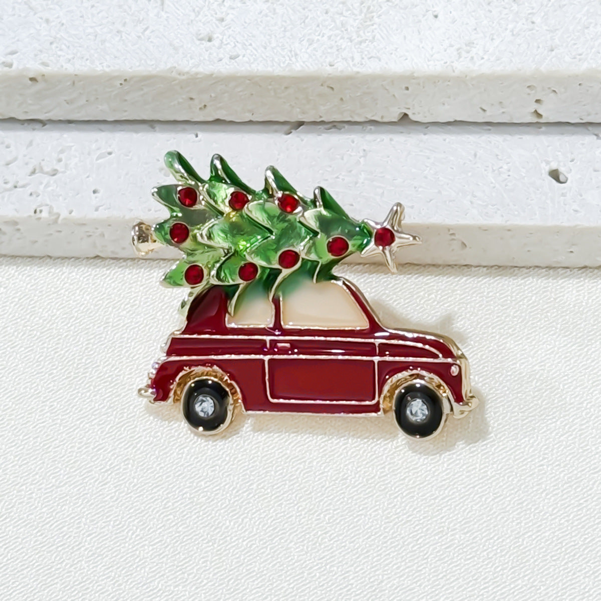 Close-up image of the Holiday Car Pin