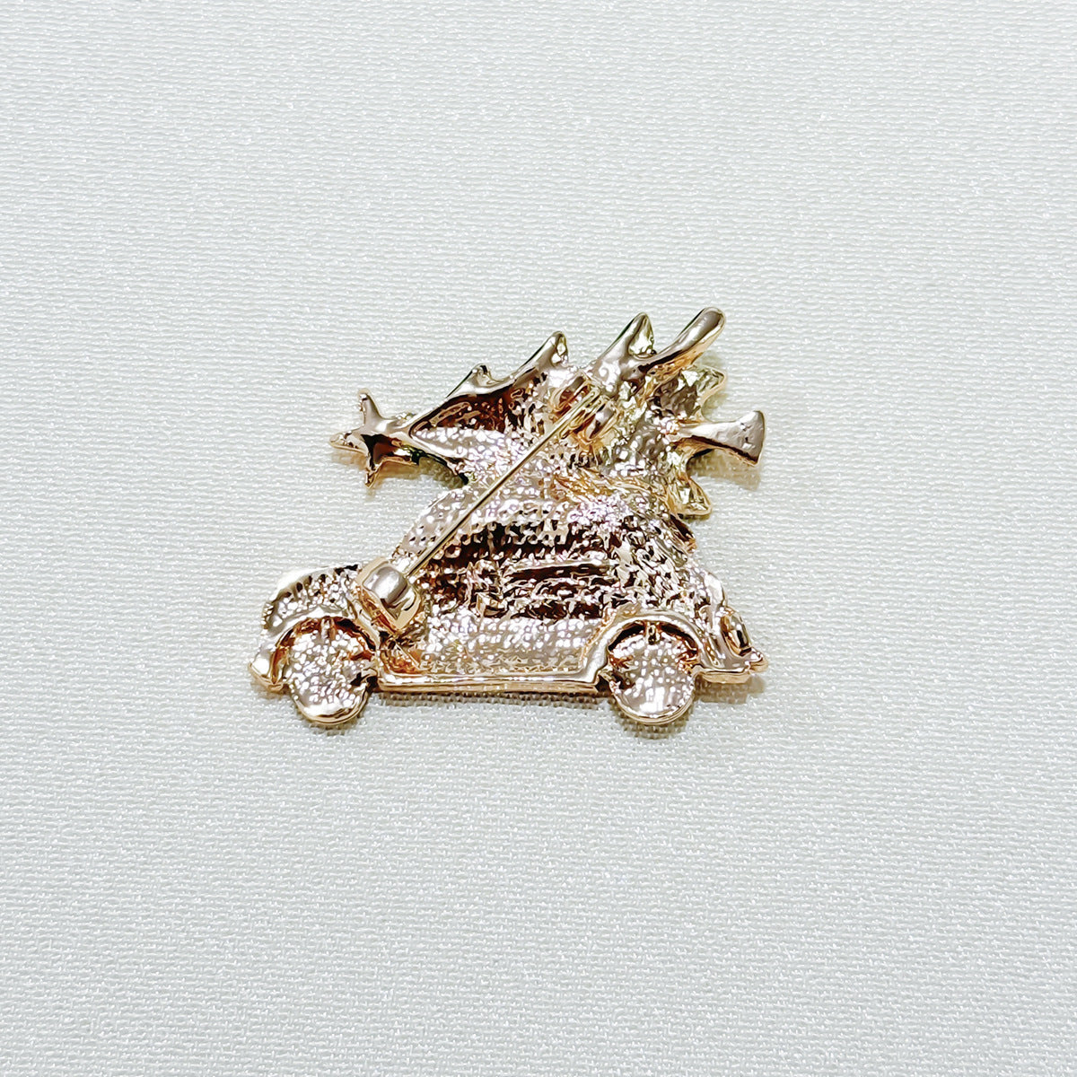 Showcasing a stylish brooch with festive design