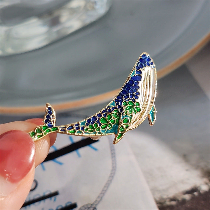 Charming dolphin pin on casual clothing