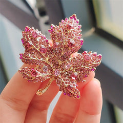 Close-up of Leaf Brooch with Sparkling Crystals