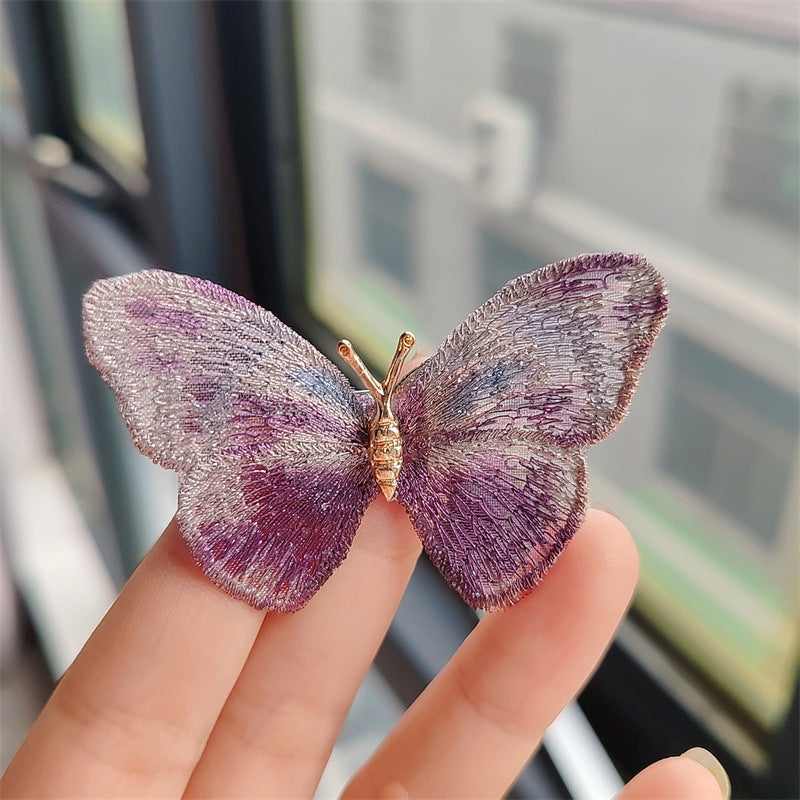 Close-up of butterfly embroidery design