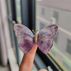 Elegant butterfly brooch on scarf