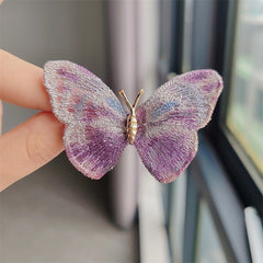 Butterfly brooch shown on a hat