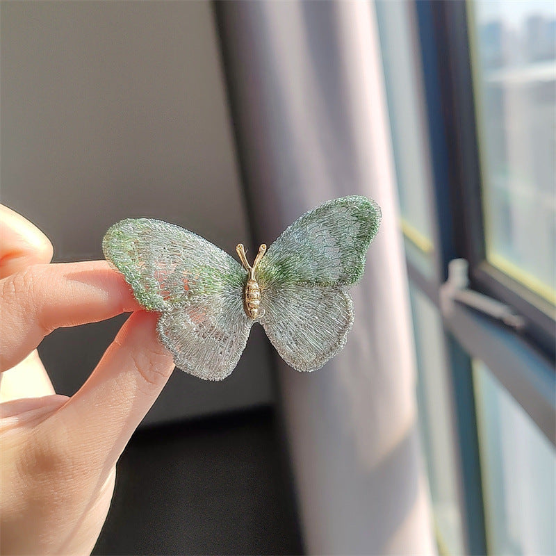 Fashionable brooch on a vintage jacket