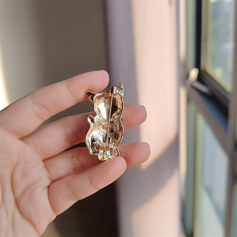 Fashionable brooch on an elegant scarf