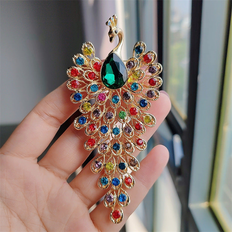Colorful peacock brooch with rhinestones