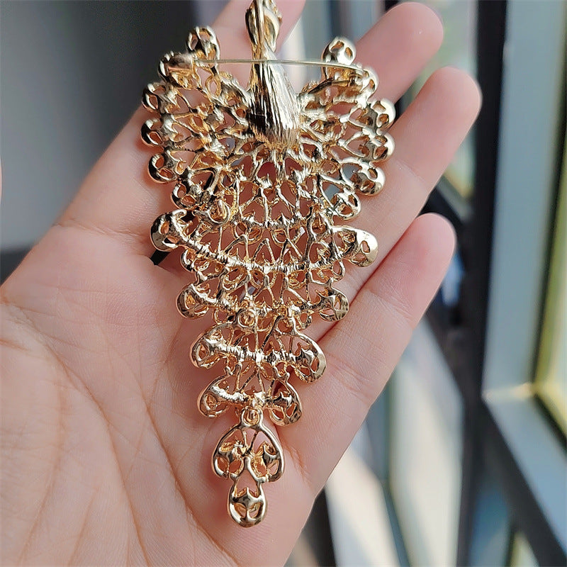Elegant peacock pin in vintage style