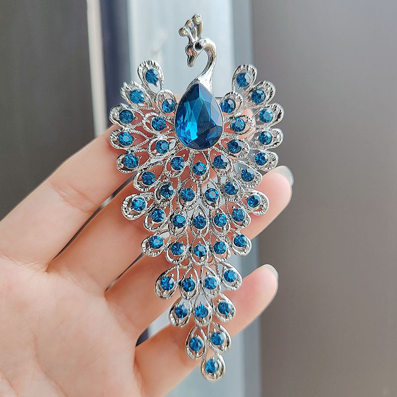 Elegant peacock pin in vintage style