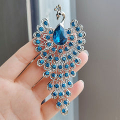 Elegant peacock pin in vintage style