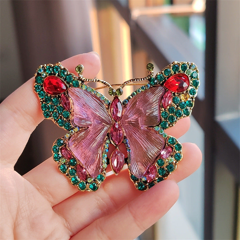 Close-up of crystal butterfly brooch design
