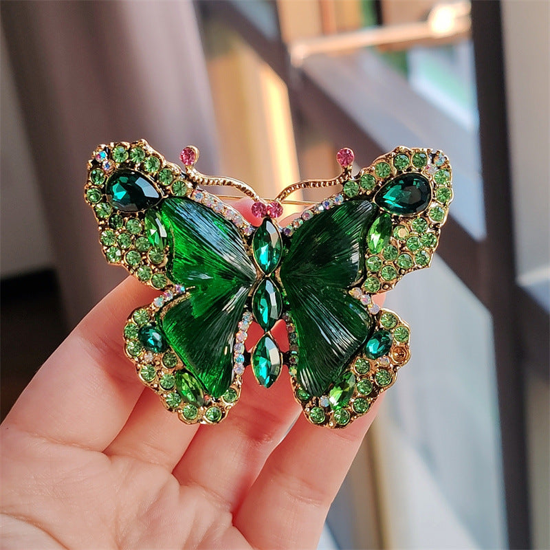 Close-up of crystal butterfly brooch design