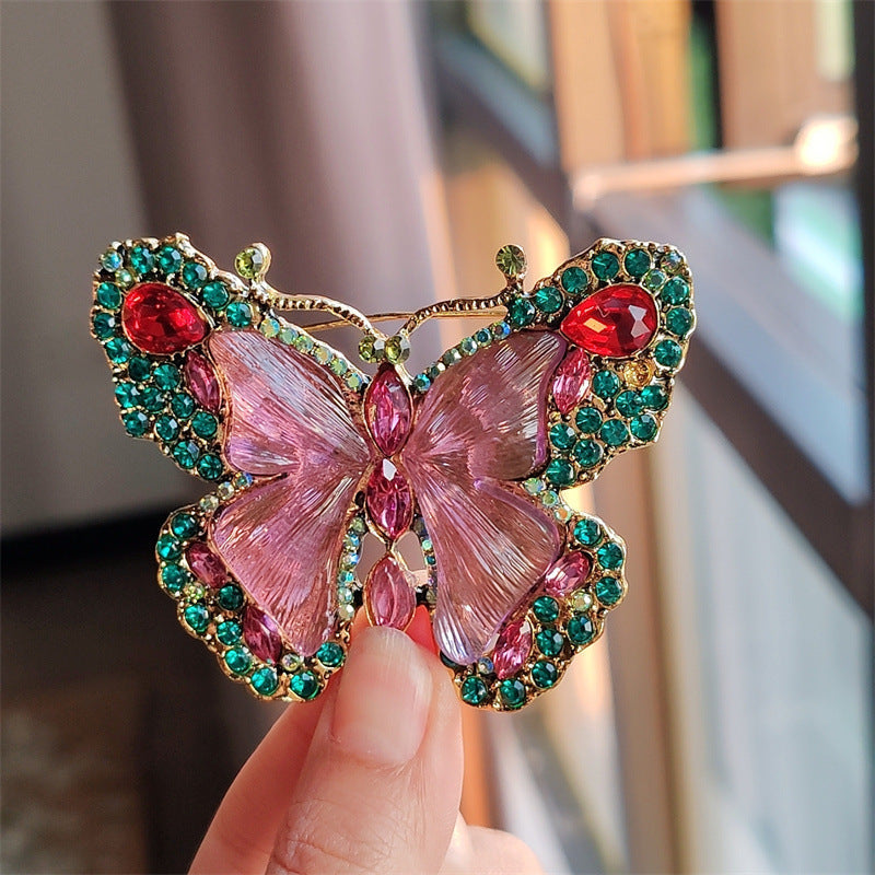 Elegant butterfly brooch worn on a scarf