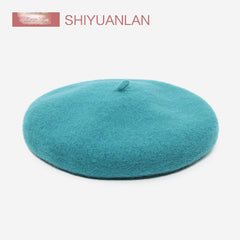 Stylish pink wool beret for winter