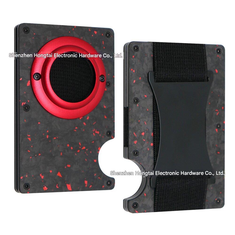 Compact aluminium wallet displayed on a table