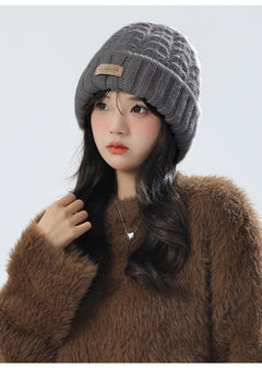 Stylish white knit winter set on display