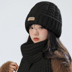 Beige knit hat and scarf set displayed on a white background