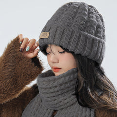 Gray knitted combo of hat and scarf for winter