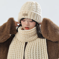 Stylish white knit winter set on display