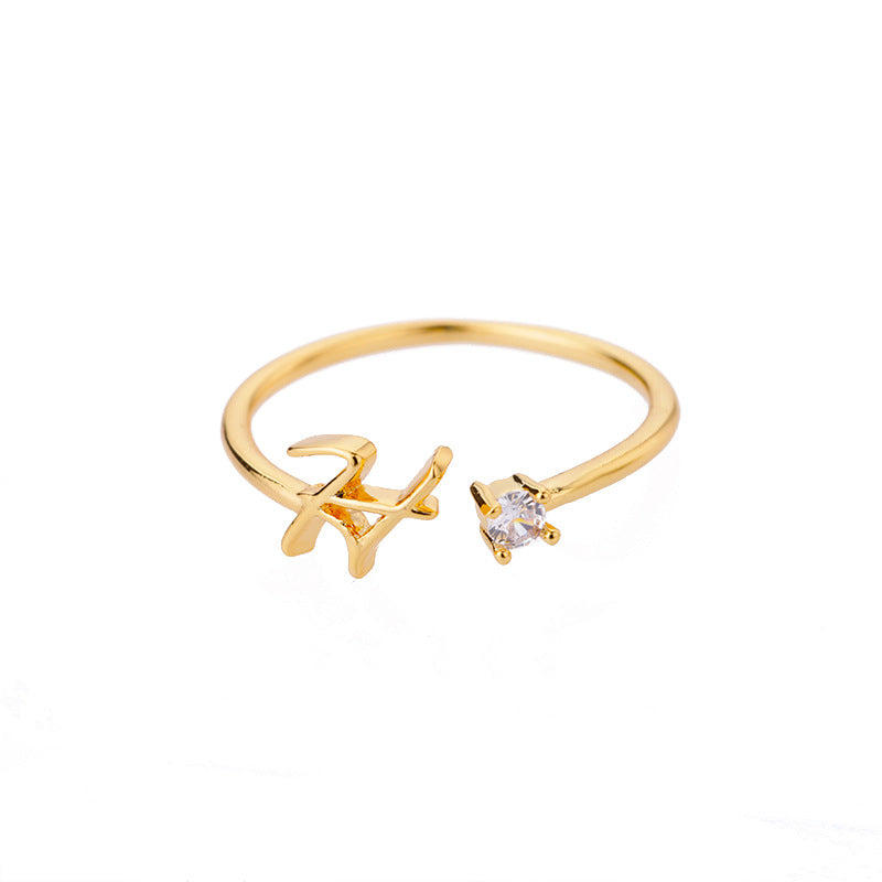 customisable gold ring displayed on cushion