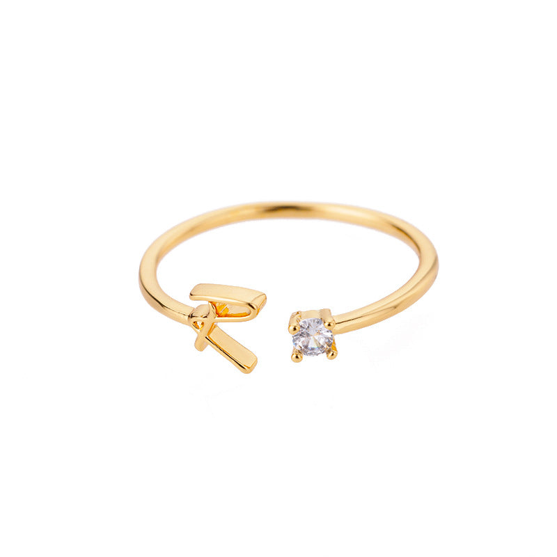 customisable gold ring displayed on cushion