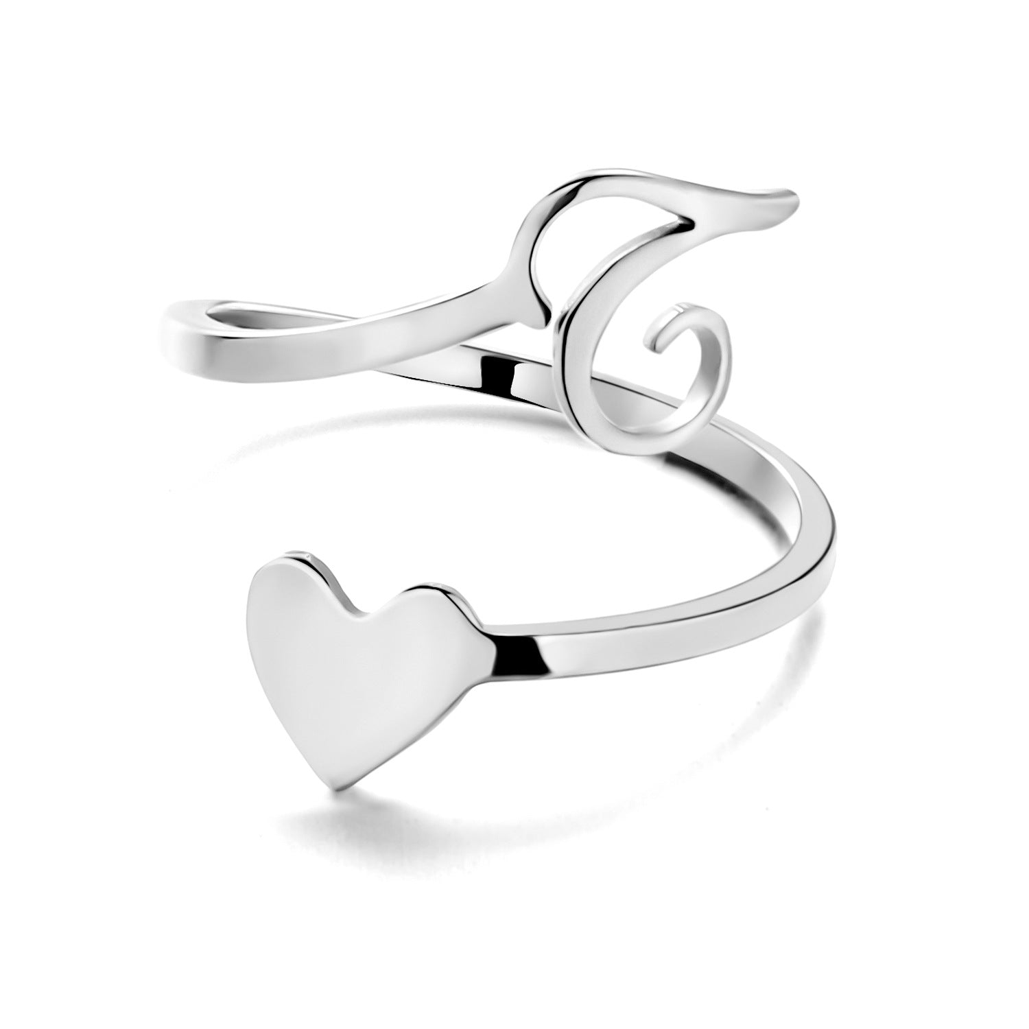 Woman's hand wearing a stylish heart design ring